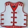 White leather vest with red straps